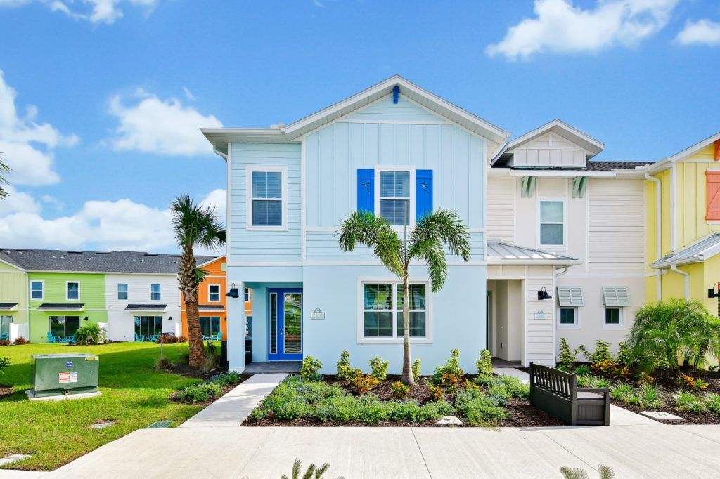 Villa exterior front with palm tree garden